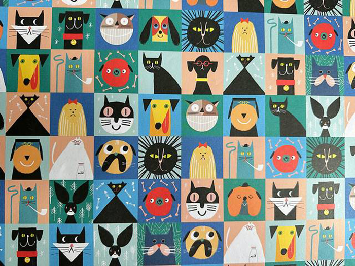 犬と猫がずらりと並んだ楽しいイラストのラッピングペーパー
