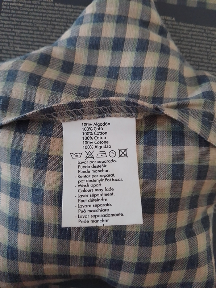 「サコ・テルミコ」の衣類ラベル